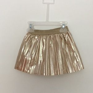 A goldish skirt